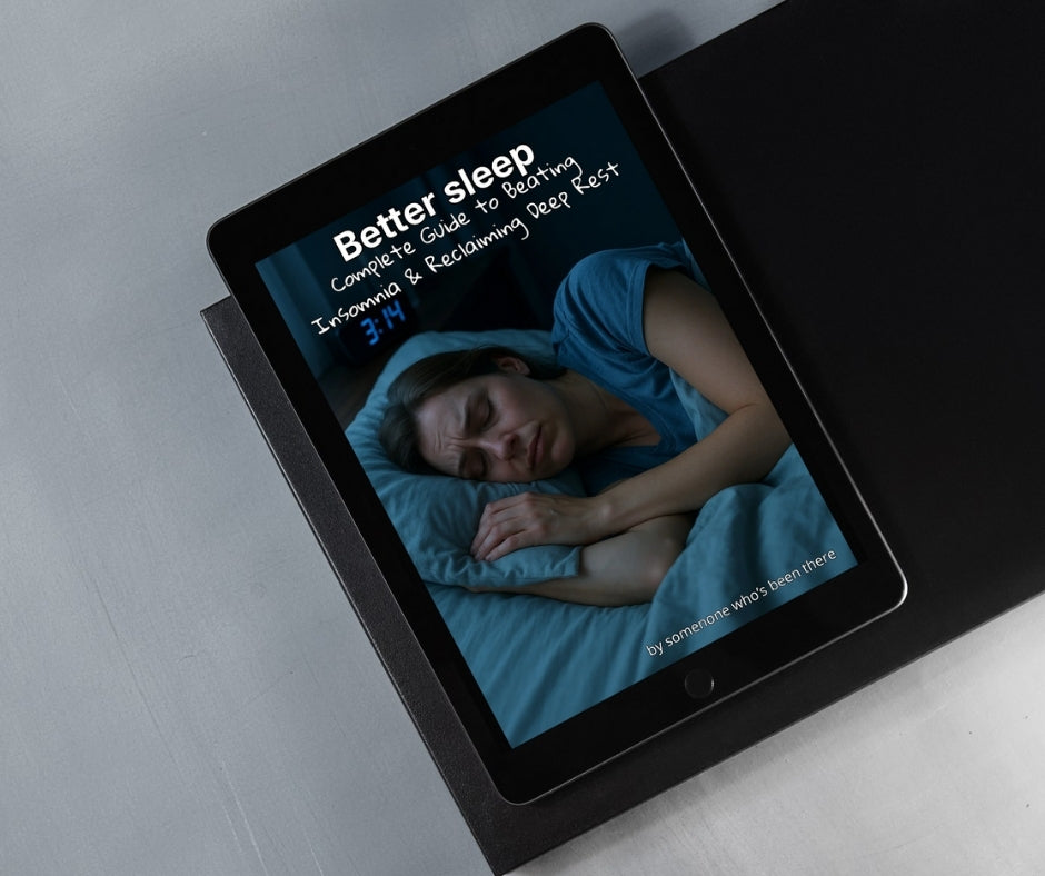 Tablet displaying a sleep aid app with a person lying down on the screen.