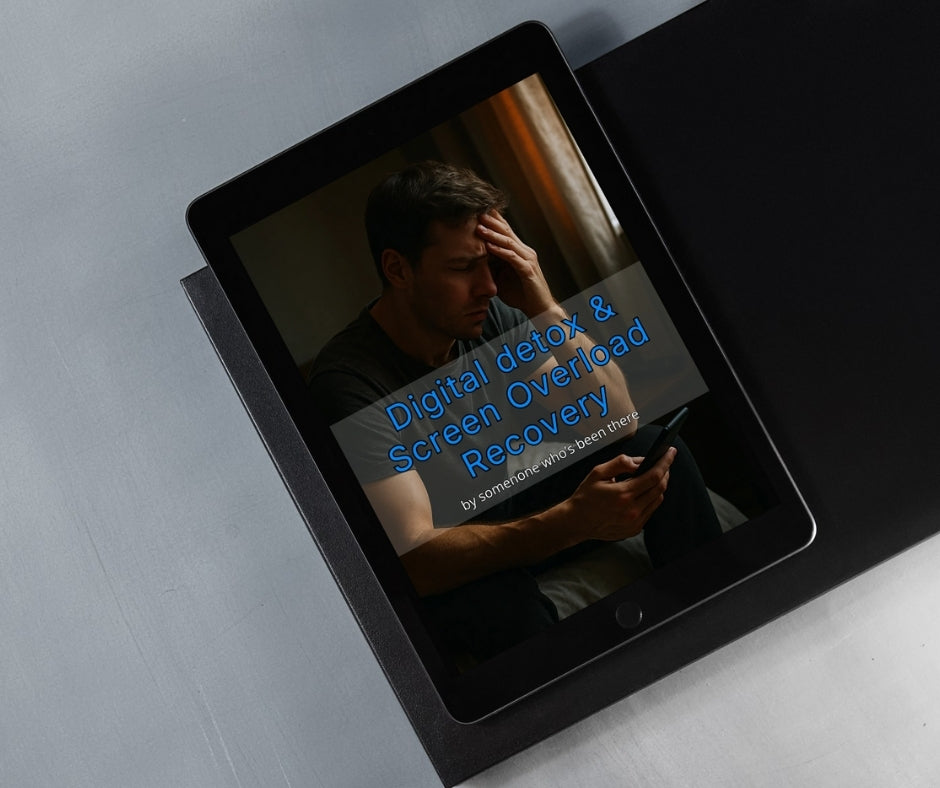 Tablet displaying a man with his head in his hands and text about digital detox and screen overload recovery.