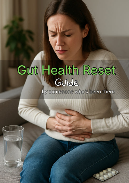 Woman experiencing stomach discomfort with a glass of water and pills on a table, text overlay 'Gut Health Reset Guide'.
